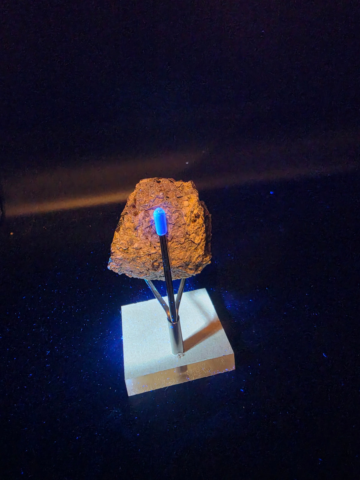 Sodalite from Mont Saint Hilaire, Glowing Orange